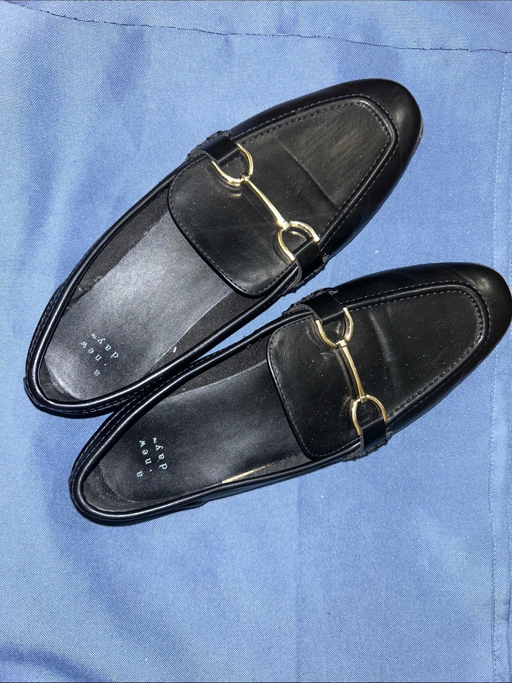 Men's Black Leather Slip-On Loafers with Gold Bit Accent